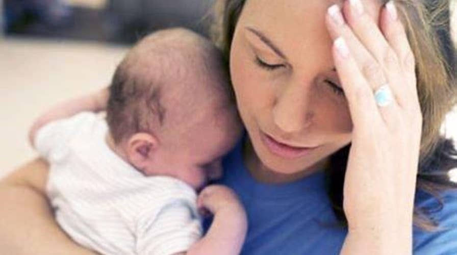 Gov't panel wants bigger focus on new mothers' mental health