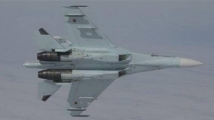 Russian jet buzzes US Air Force spy plane 