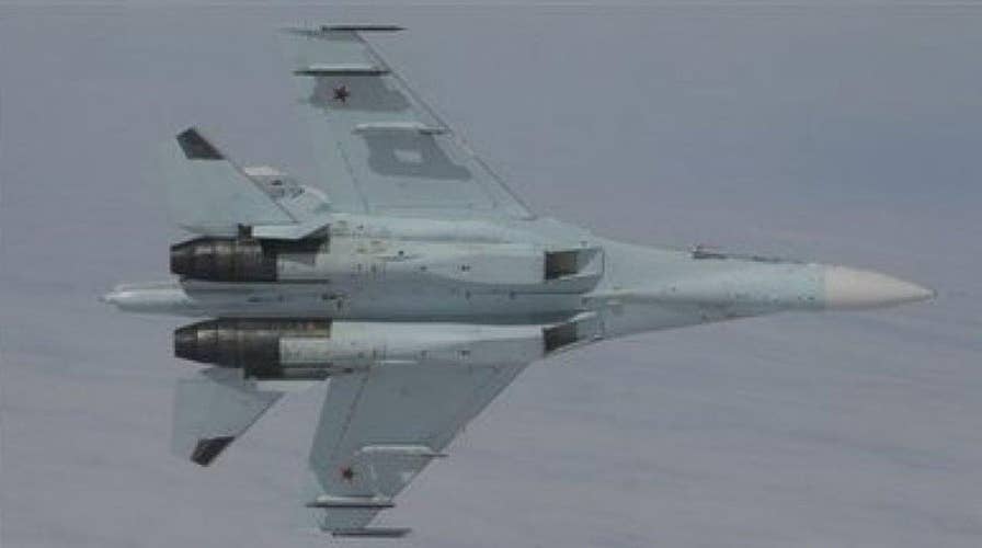 Russian jet buzzes US Air Force spy plane 