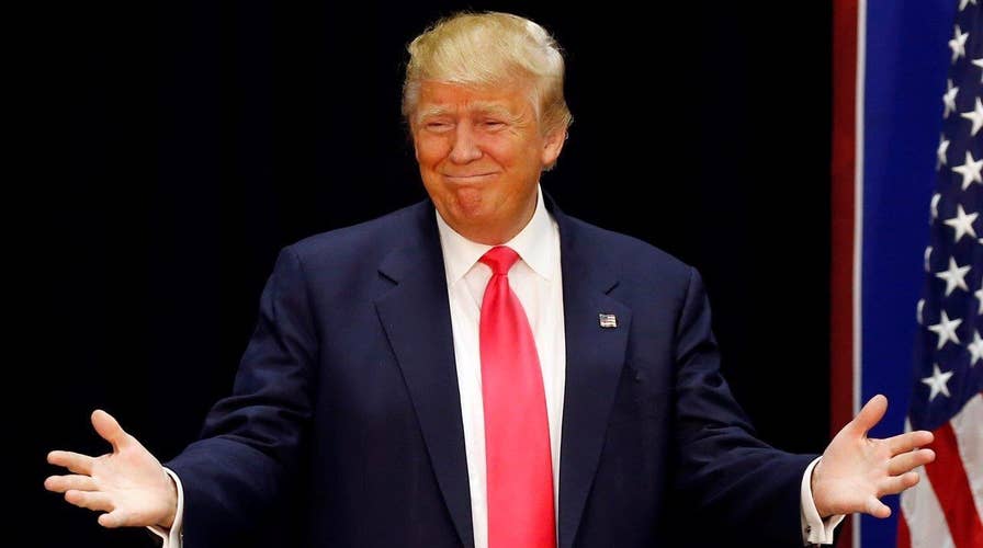 Donald Trump reacts to post Iowa polls, Democratic debate