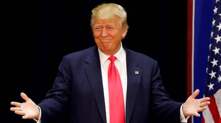 Donald Trump reacts to post Iowa polls, Democratic debate