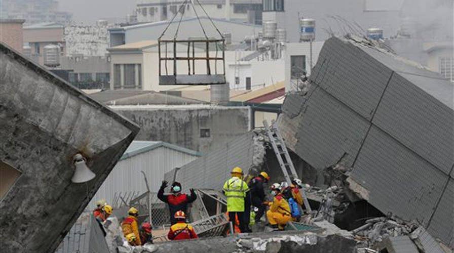 At least 14 dead, 100 missing after earthquake hits Taiwan