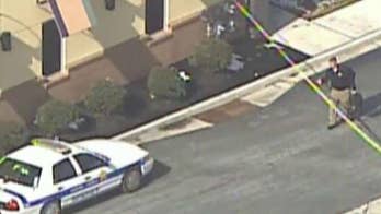 Gunman in deadly Panera shootout never spoke ill of cops, son says