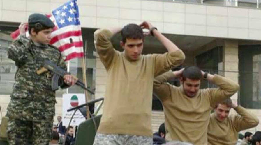 Iran mocks captured US sailors at parade