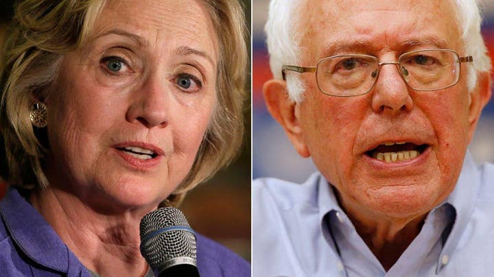 Clinton, Sanders go after each other's proposals in debate