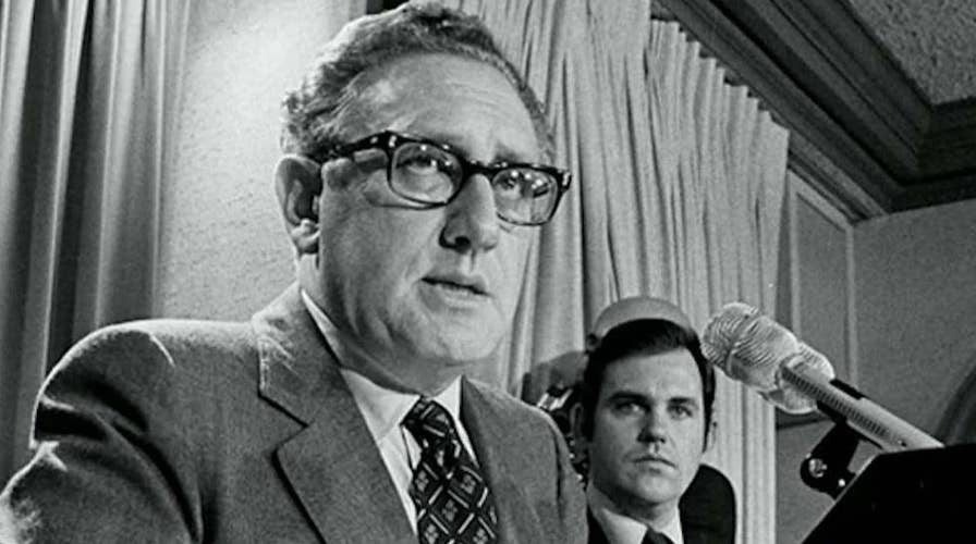 Henry Kissinger takes center stage at Democratic debate