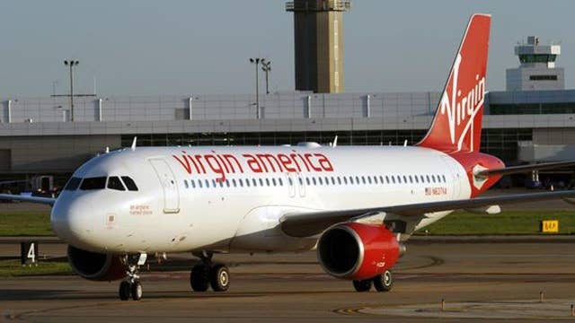 Virgin Airlines jet forced to land after pilot hit by laser