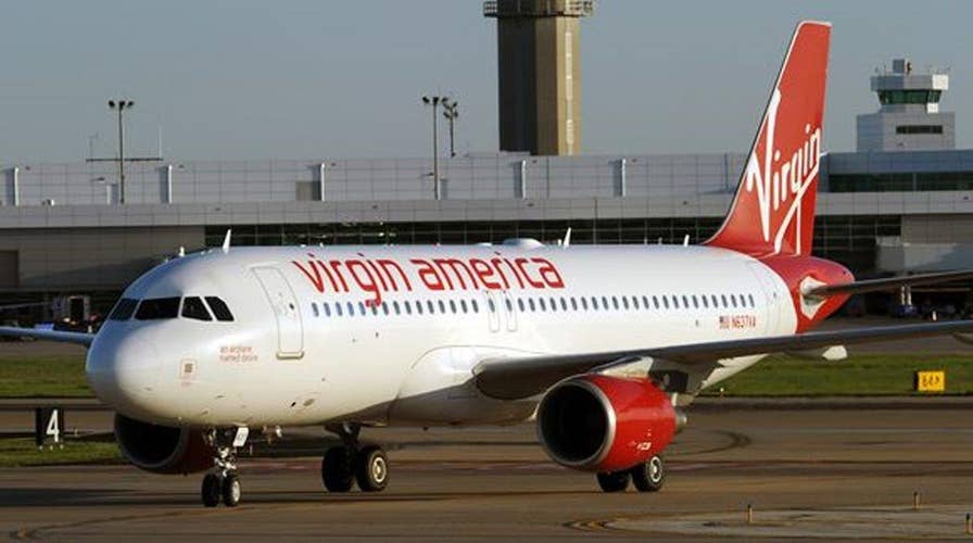 Virgin Airlines jet forced to land after pilot hit by laser