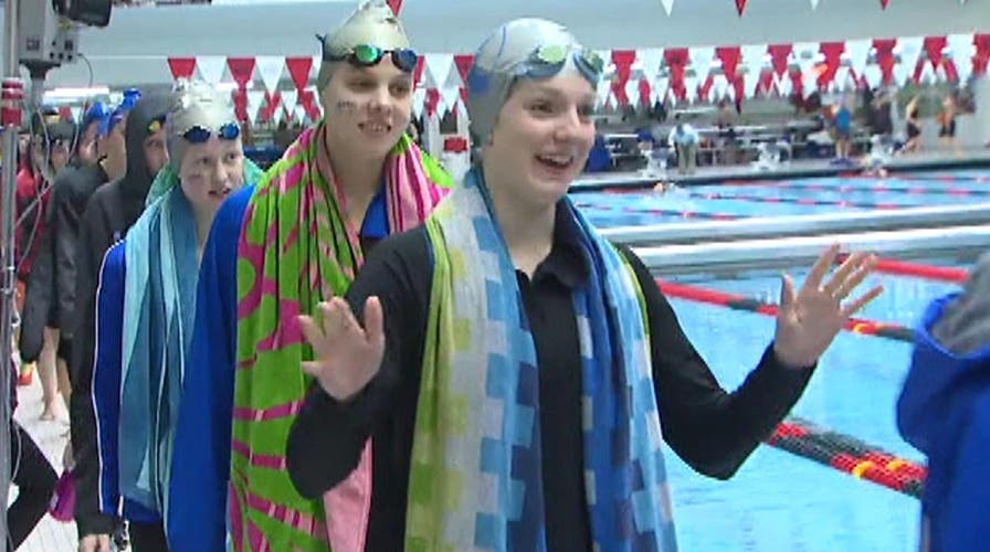 Girls swim team makes high school athletics history