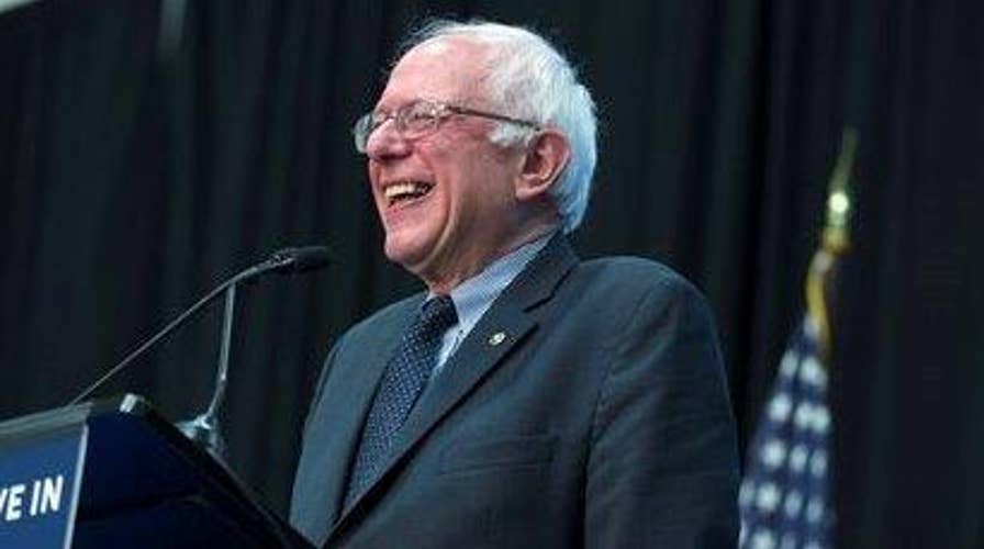 Sanders brands himself a Democratic socialist