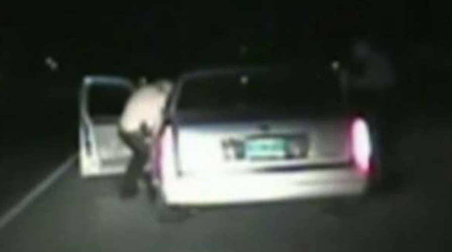 Deputy hangs on for dear life as suspect flees traffic stop