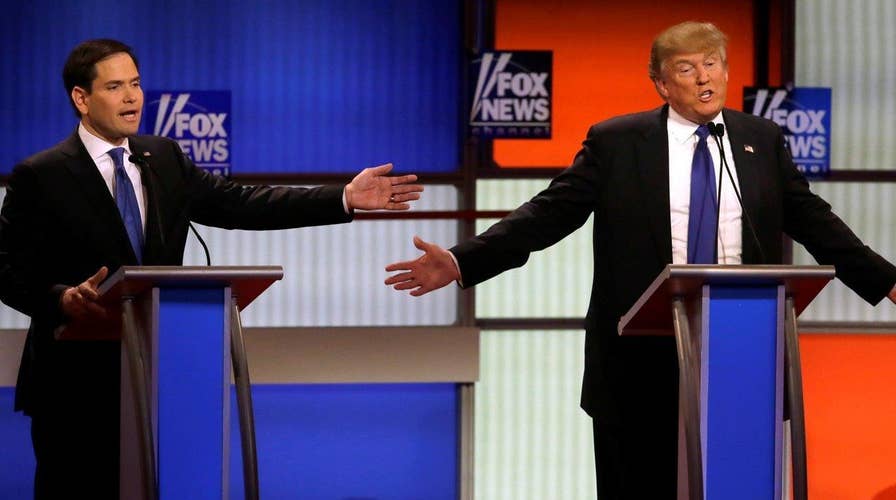 Republican rivals target Trump during Fox debate in Detroit