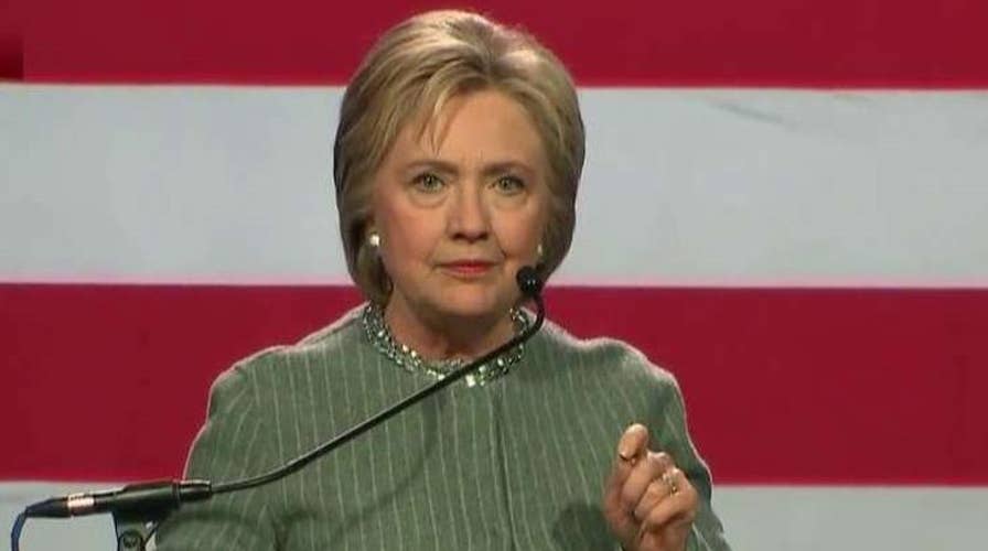 Clinton: Instead of building walls, we knock down barriers