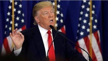 Sanders upsets Clinton in Michigan; Trump notches three more wins