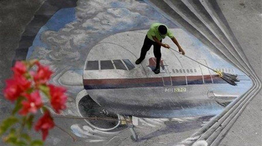 Malaysia Airlines Flight 370 mystery lives on, 2 years later