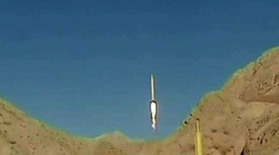 Iran test-fires two ballistic long-range missiles