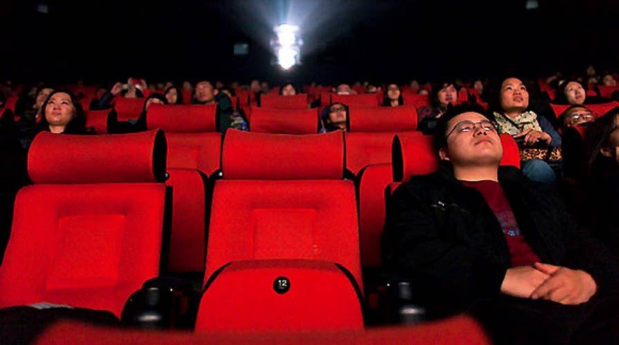 Theaters use lasers to shame cell phone users