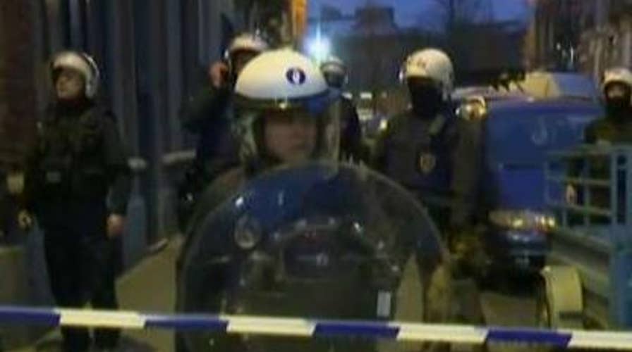 Paris attacker wounded, captured in police raid in Belgium