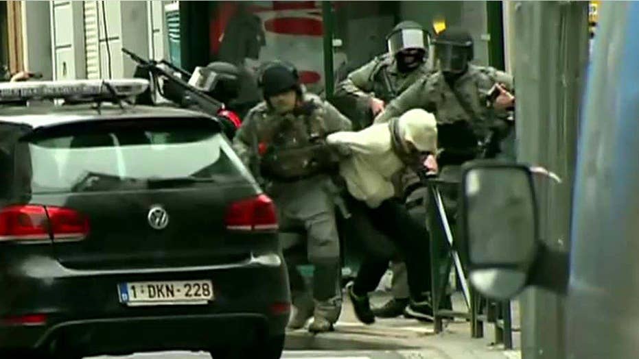 Watch authorities take Paris terror suspect into custody