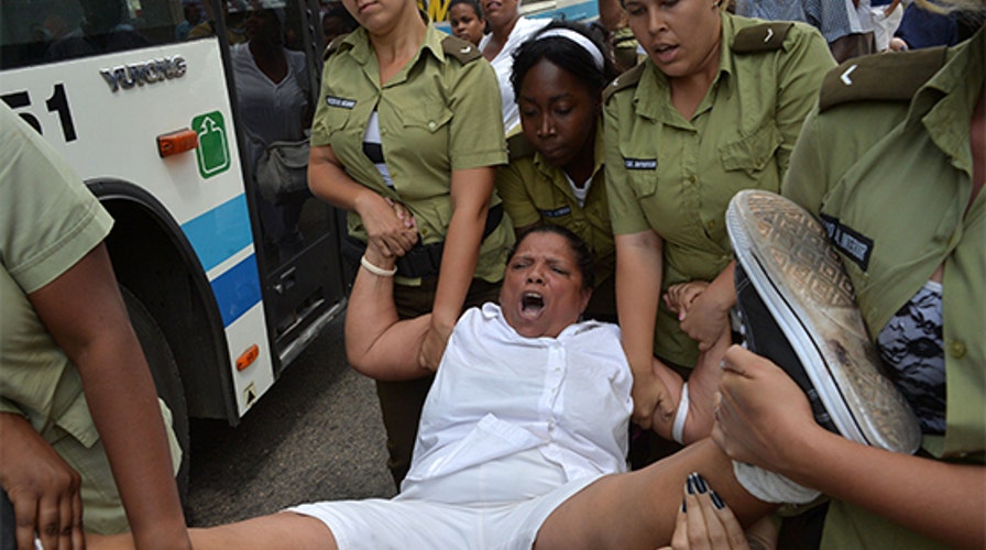 'Ladies in White' arrested hours before Obama visit