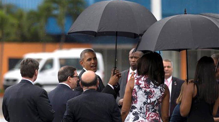 Obama and first family arrive in Cuba for historic visit