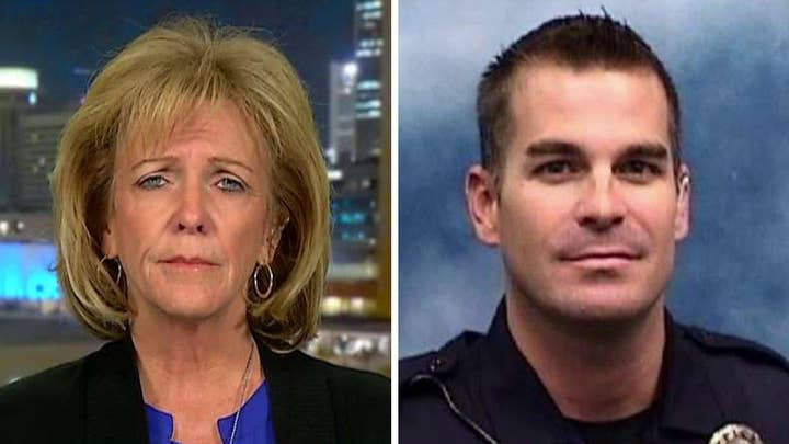 Mother of officer killed by illegal on immigration debate