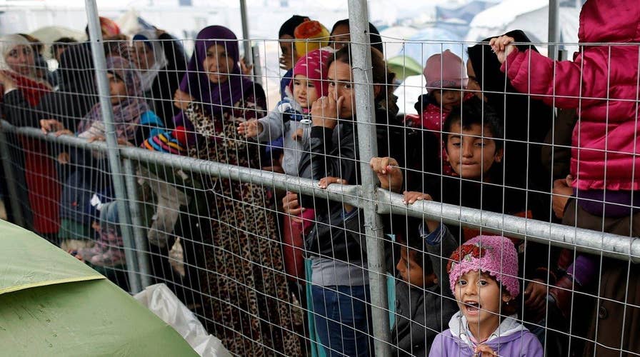 Should nations stop taking in refugees from Syria, Iraq?