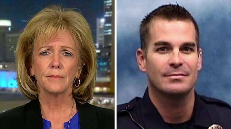 Mother of officer killed by illegal on immigration debate