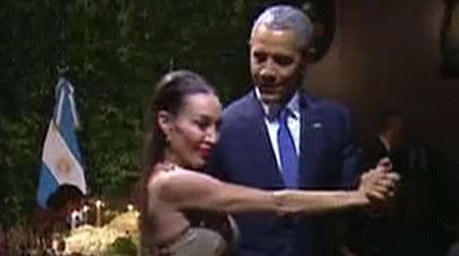 Obama faces fallout for trip abroad following Belgium attack