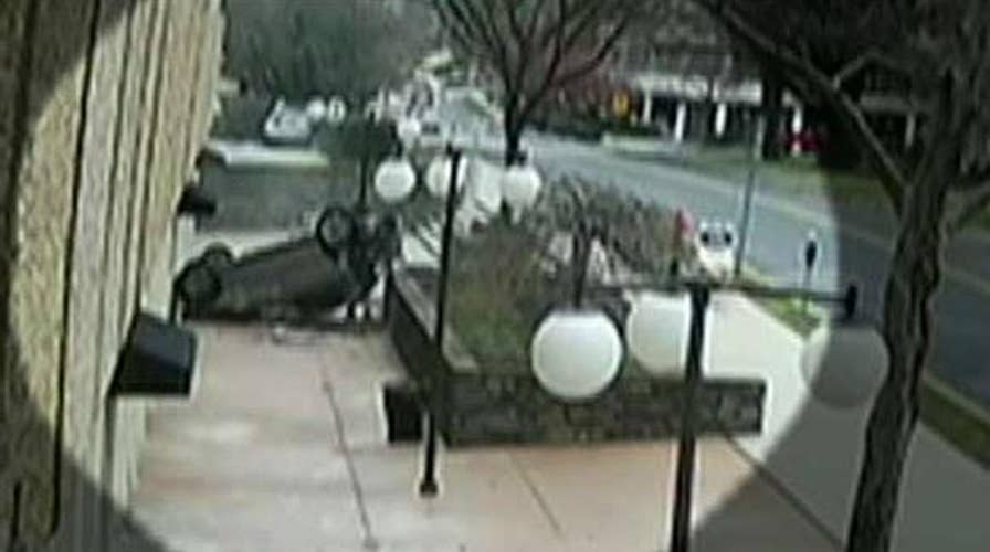 Kennedy's Topical Storm: Raining Cars and Dogs