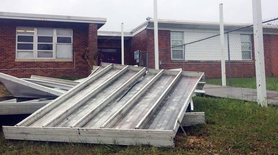 Tornadoes tear through Deep South states