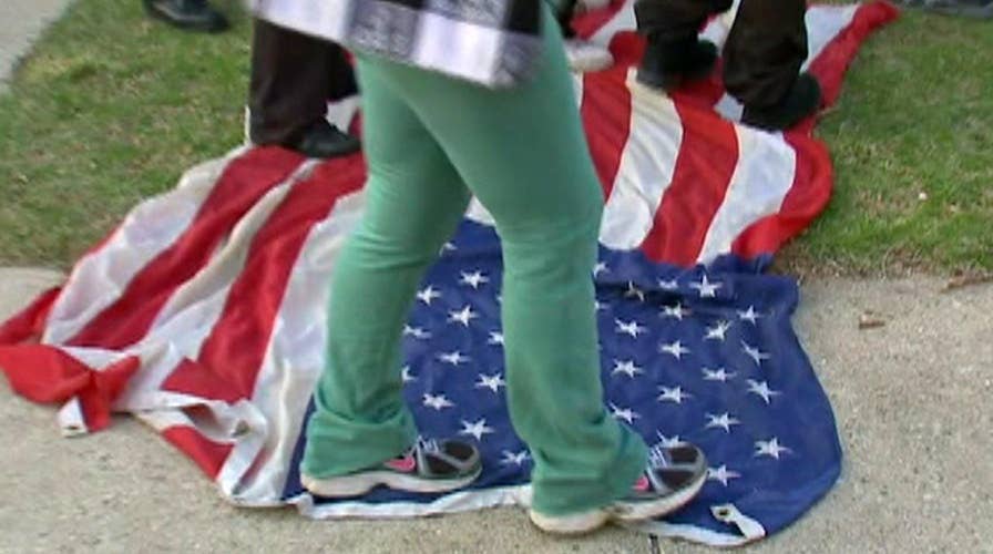 Flag-stomping protesters sparking outrage on campaign trail