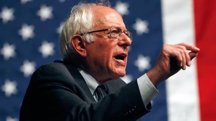 Sanders escalates spat with Clinton over qualification