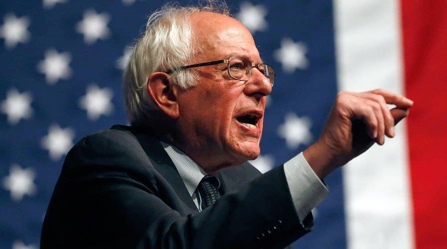 Sanders escalates spat with Clinton over qualification