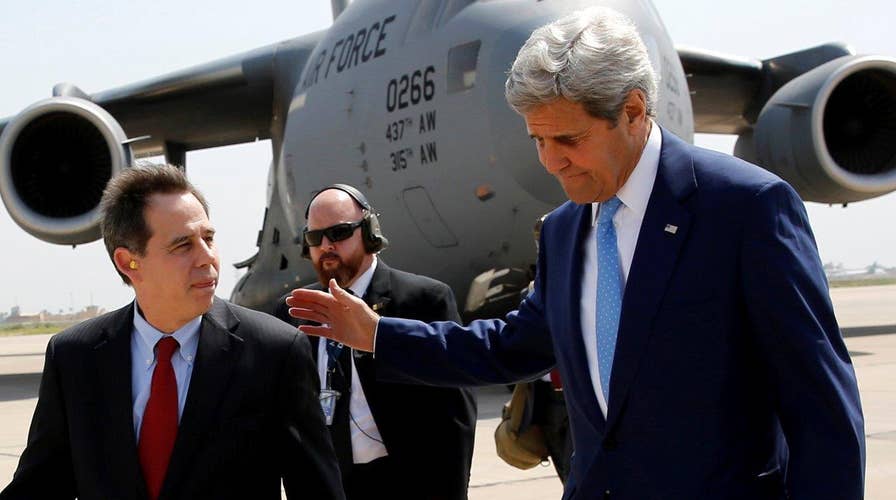 Kerry makes surprise visit to Iraq to discuss ISIS strategy