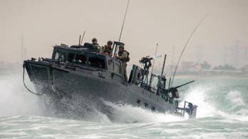 Navy officer charged with espionage now held in brig