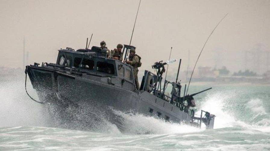 US Navy officer faces espionage, prostitution charges