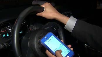 Distracted driving clampdown: Cops could get 'textalyzers'