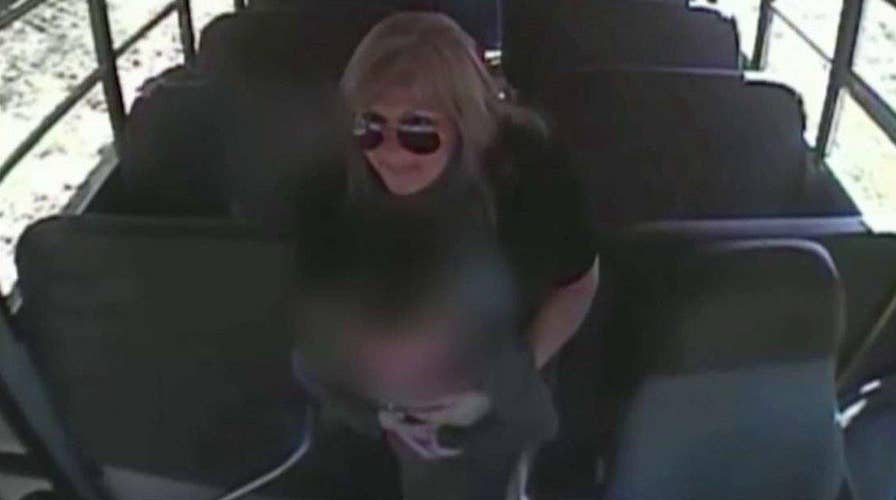 Quick-thinking teacher's aide saves boy choking on coin