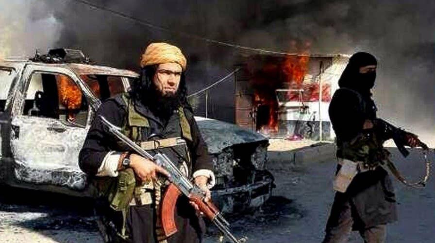 Obama visits CIA as role in war against ISIS expands