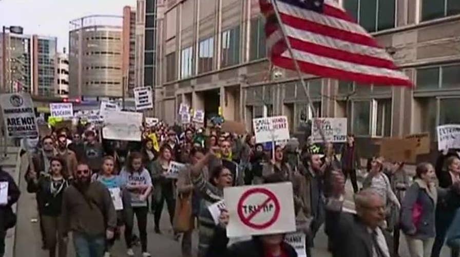 Protesters gather outside Trump rally