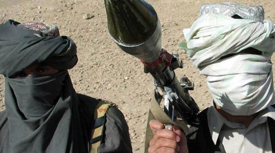 Taliban soldiers attack a gov't security agency in Kabul