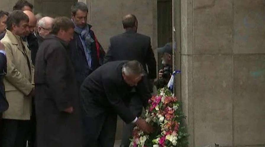 Brussels remembers 32 killed one month after terror attacks