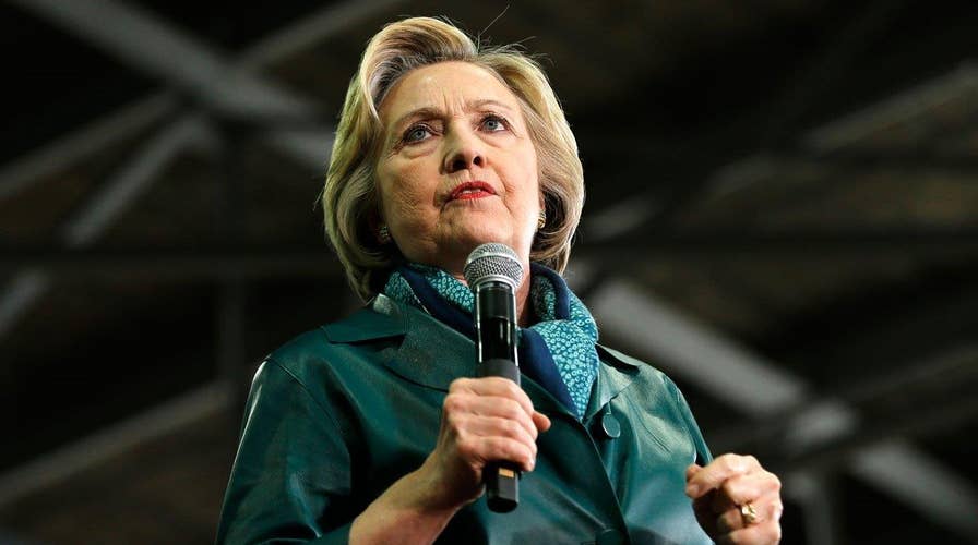Clinton hammers Republicans despite Sanders renewing attacks