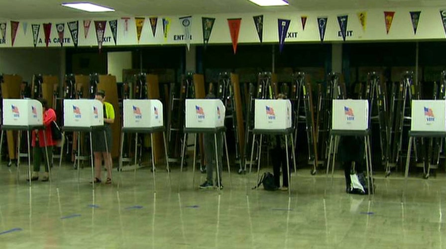 Voters hit polls in Maryland, record turnout expected