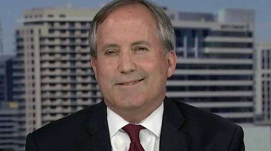 Texas attorney general defends voter ID law