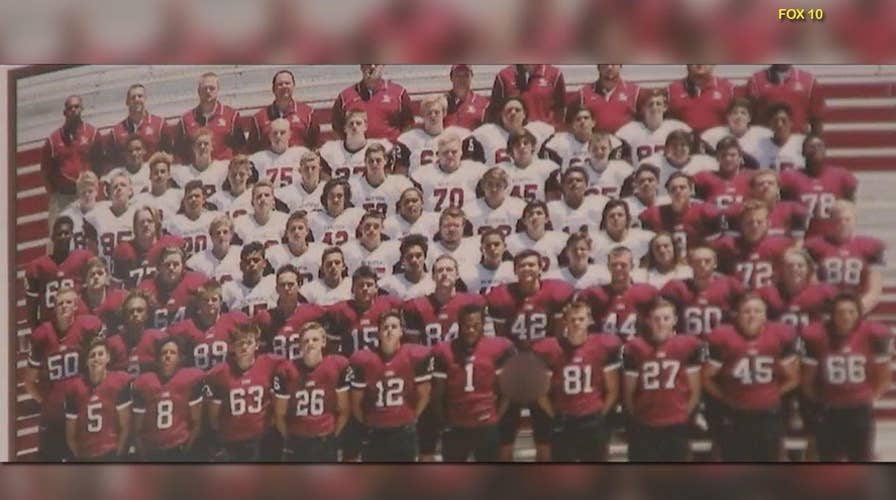 Teen arrested for flashing privates in yearbook football pic
