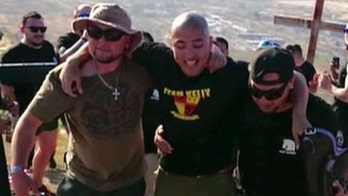 Video of retired Marine crawling to top of hill goes viral, offers inspiration