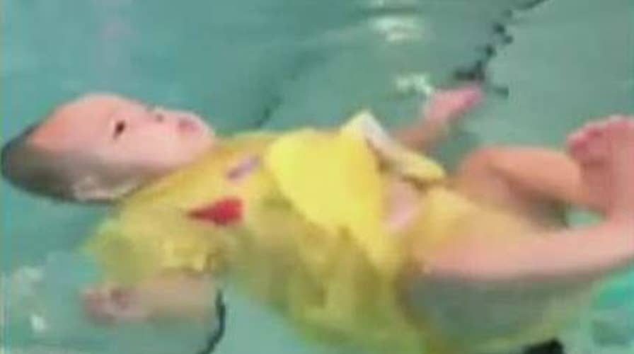 Baby's swim survival lesson draws outrage, praise online