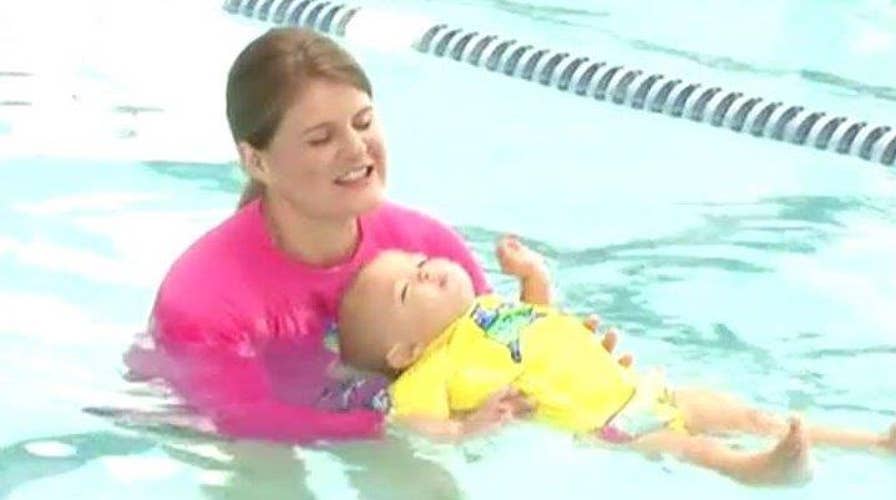 Baby learning hot sale to float